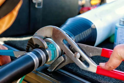 Pipe repair service using professional plumbing tools in Lynn Haven, Florida
